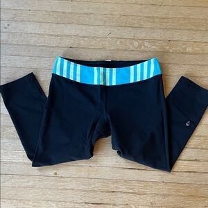 GUC Ivivva by Lululemon blue and yellow waist band reversible cropped leggings